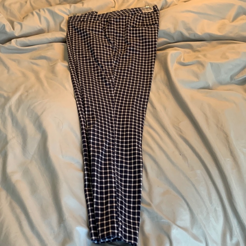 Blue and white plaid ankle-length pants.
